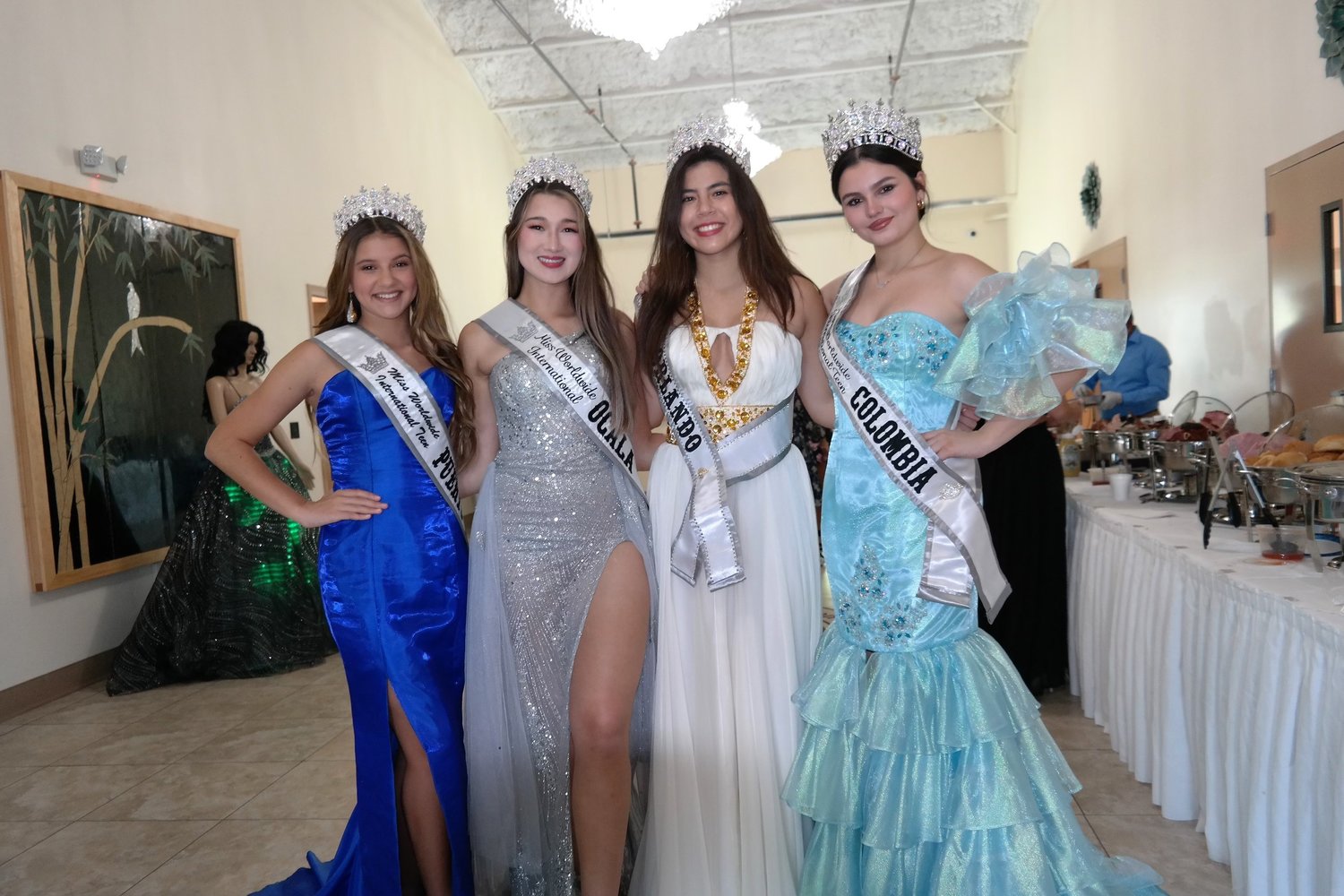 After the Veterans' Memorial Park dedication, a fashion and pageantry event was held.

Left to right are Miss Puerto Rico International, Miss Ocala , Florida, Miss Orlando, Florida and Miss Colombia International
